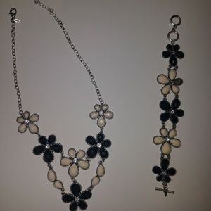 Black and off white flower shaped necklace and bra